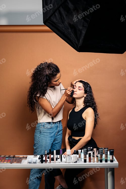 Preview: Model Getting her Make up Done