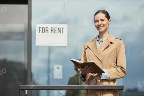 Preview: Smiling Young Woman Renting Office