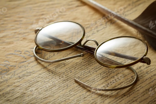 Preview: Vintage Eyeglasses on Antique Document with Quill Pen