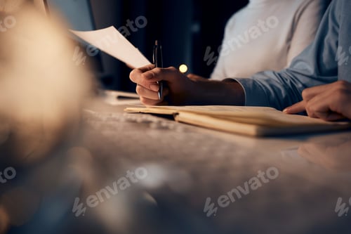 Preview: Hand, writing or financial advisor team at night for finance, investment review or planning global