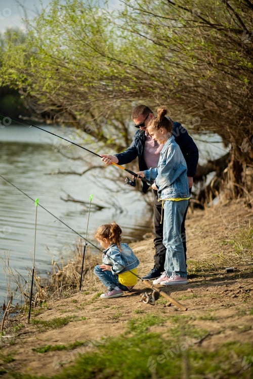 Preview: A dad and his two daughters are fishing in the river.