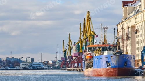 Preview: Moored ships and harbor cranes in port