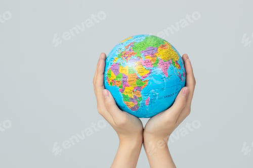 Preview: Holding a blue globe isolated on gray background