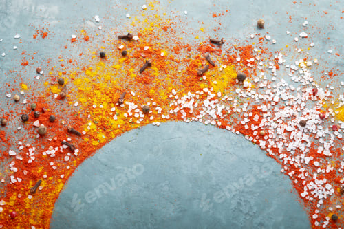 Preview: Round frame composition, different spices scattered on the table