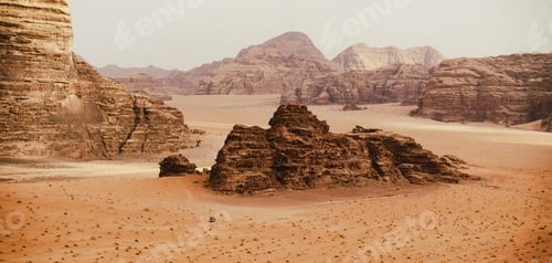 Preview: Wadi Rum desert, Jordan, The Valley of the Moon. Orange sand, haze, clouds.