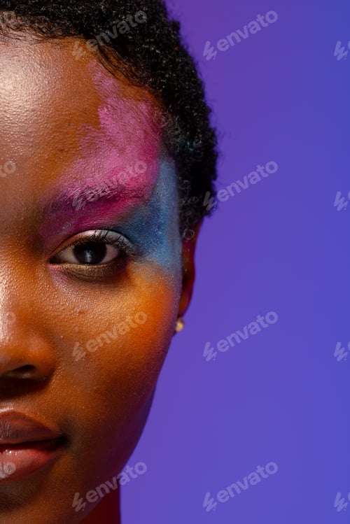 Preview: Half portrait of african american woman with short hair and colourful makeup