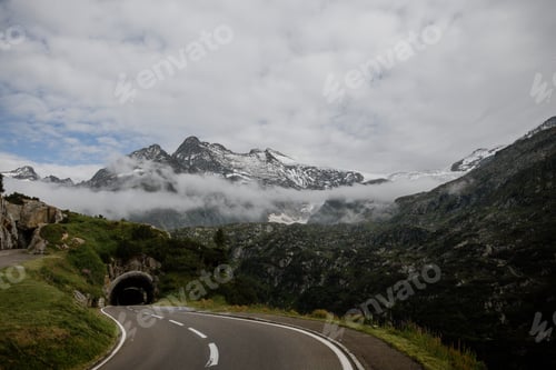 Preview: Empty Road and Mountain Tunnel in Alps