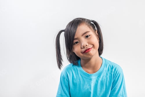 Preview: Portrait of Funny little girl acting in studio shot