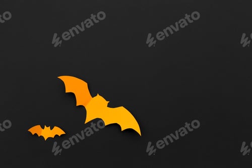 Preview: halloween and decoration concept - paper bats flying