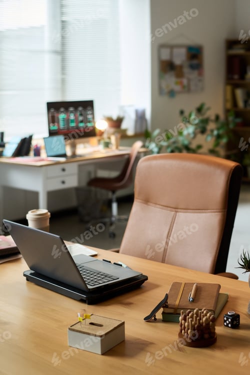 Preview: Empty Modern Office Workspace Featuring Laptop and Stationery on Desk