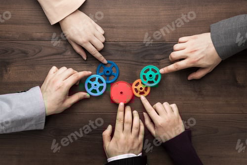 Preview: Teamwork Concept On The Brown Wooden Table Background