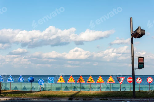 Preview: Group of road signs with a sea background