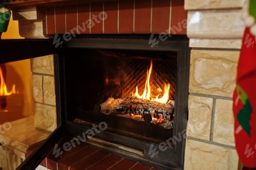 Preview: Home fireplace in warm living room on winter day.