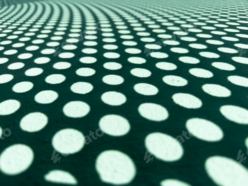 Preview: Perforated metal mesh with circles and geometric shadows projected onto a green wall