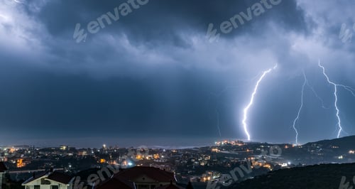 Nighttime Lightning Storm over the City Lights