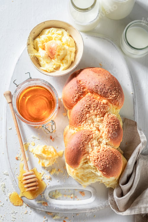 Preview: Fresh challah with honey and milk for breakfast