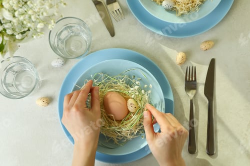 Preview: Girl makes Happy Easter table setting, top view