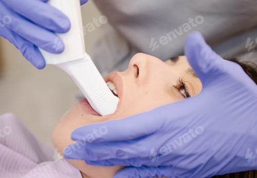 Preview: Crop dentist examining teeth of patient