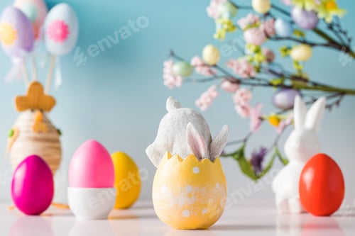 Preview: Festive Easter composition with a rabbit in an Easter egg on a floral background