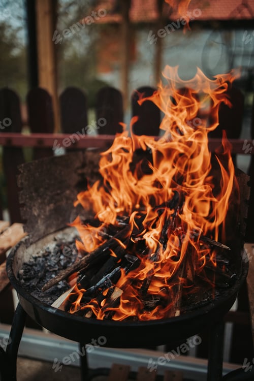 Preview: Vertical shot of burning charcoal in a grill