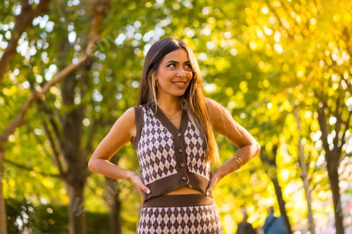 Preview: Portrait of a caucasian brunette woman in autumn in a natural city park, autumn lifestyle