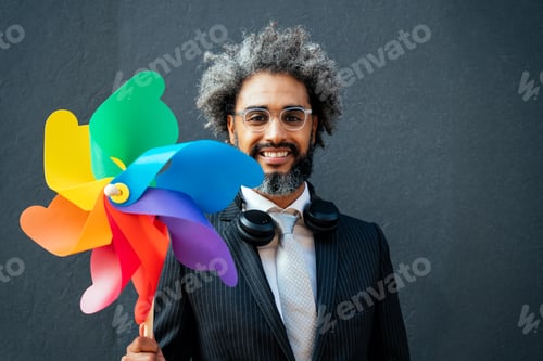 Preview: image of a young entrepreneur going to work in his successful start up business