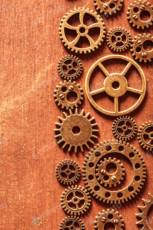 Preview: steampunk mechanical cogs gears wheels on wooden background