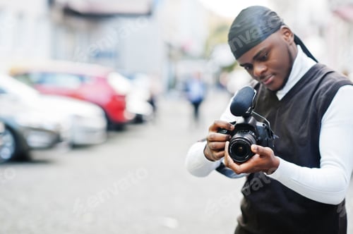 Preview: Young professional african american videographer