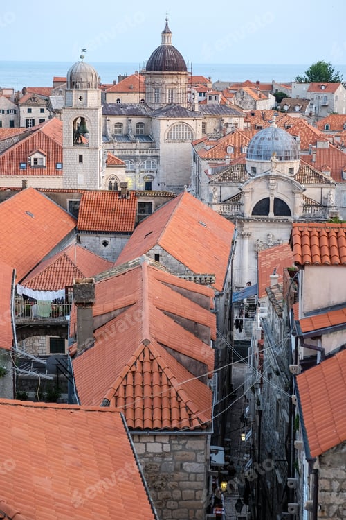 Preview: Vertical high angle shot of the red roofs of the buildings in Dubrovnik, Croatia