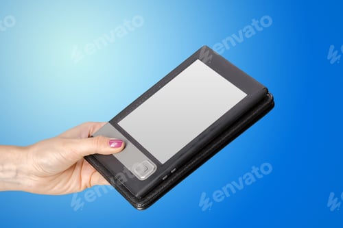Preview: Hand holding e-book reader isolated on white background
