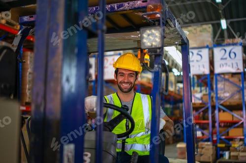 Preview: Blue collar worker is working at warehouse.