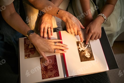 Preview: Adult Women Reviewing Family Photo Album for Memory Sharing