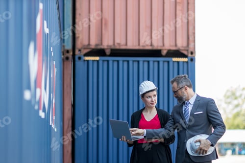 Preview: Businessman and Secretary work at Container cargo site check up goods in container.