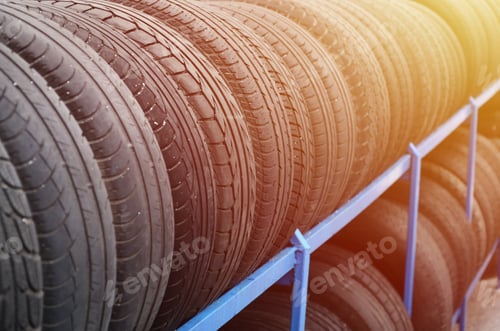 Preview: Rack with variety of car tires in automobile store