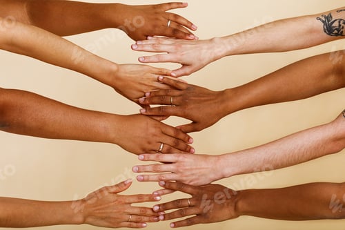 Preview: Four unrecognizable diverse women holding to each other