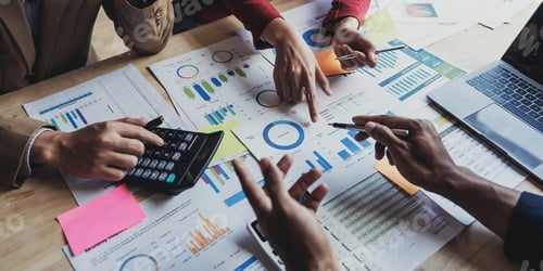 Preview: Financial Team Analyzes Data Charts in Office