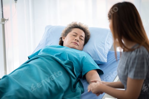 Preview: health insurance concept, young Asian woman are visit her senior family patient at hospital room