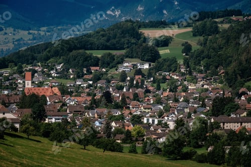 Preview: Summer view of a beautiful apline village in Switzerland