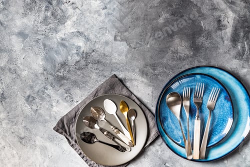 Preview: Empty Blue Plates on Grey Background