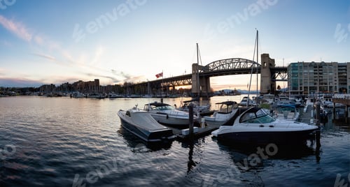 Preview: Panoramic View of False Creek, Burrard Bridge, Boats in Marina in a modern city during sunset