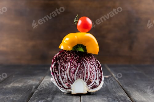 Preview: Close-up view of fresh seasonal vegetables on rustic wooden table top