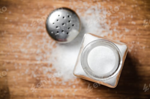 Preview: Salt background . On wooden table.