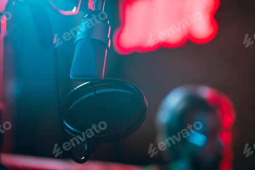 Preview: Close-up of musician performing in neon light. Concept of advertising, hobby, music, festival