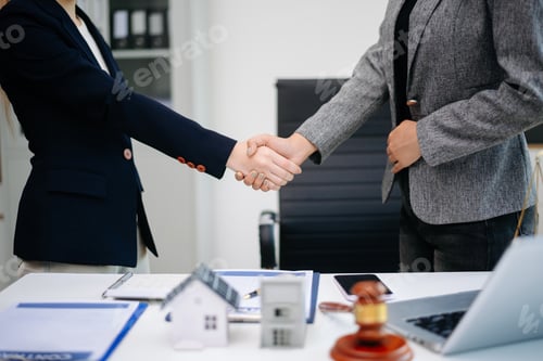 Preview: Professional business handshake after real estate contract agreement, showing partnership,