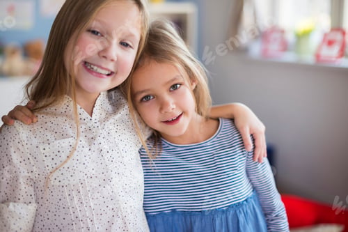 Preview: Close up of sisters embracing each other