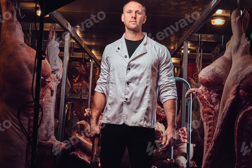 Preview: The butcher in a meat factory.