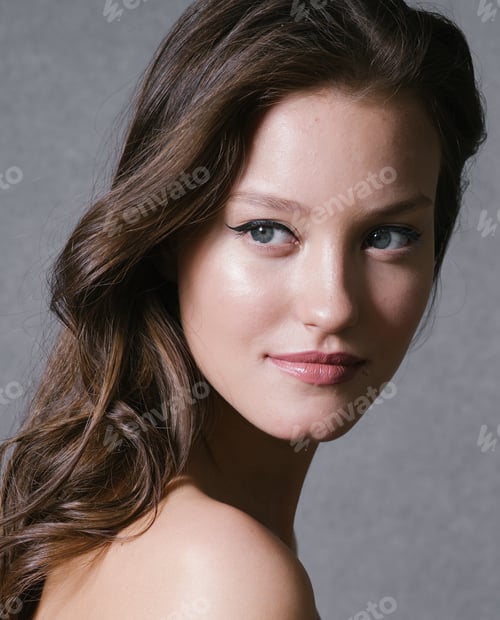 Preview: Long hair beautiful woman art portrait studio over gray background. Curly flying hair.