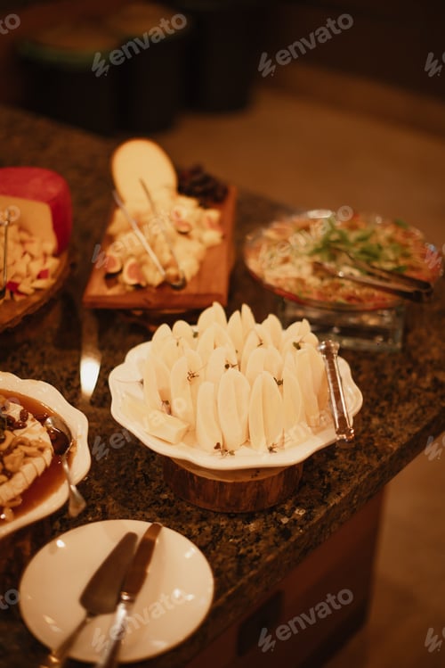 Preview: Variety of delicious desserts on trays on a table during a wedding celebration