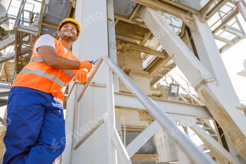 Preview: African male engineer inspecting site at construction plant