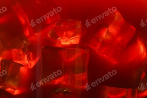 Preview: Refreshing coffee with ice cubes as background, closeup